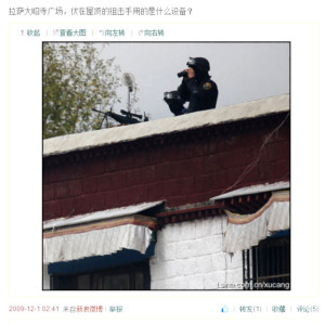 Paramilitary member on rooftop in Lhasa