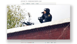Paramilitary member on rooftop in Lhasa