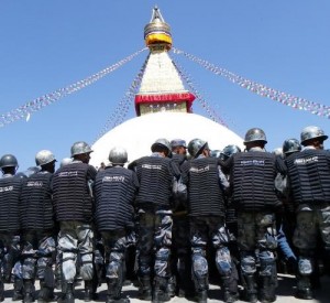 Hundreds of police in riot gear gathered around key Tibetan centers