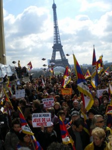 Demonstrators protest in front of the Eiffel Tower