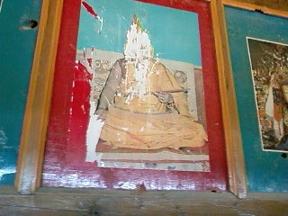 Defaced Dalai Lama photo