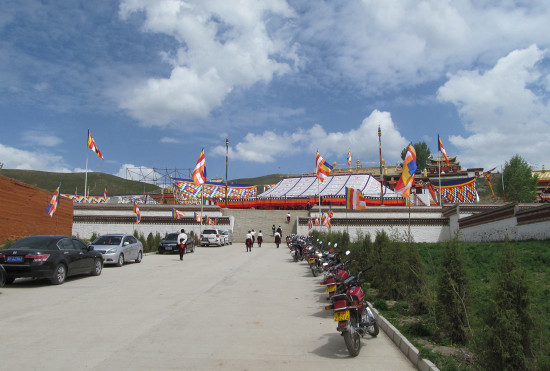 A traditional tent and Buddhist flags flying in Tsoe monastery the week before the Kalachakra teachings.