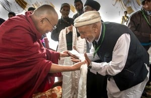 Dalai Lama being offered a khata