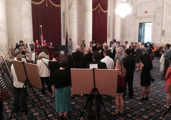 Assembled Tibetans and Tibet supporters gather in the Kennedy Caucus Room.