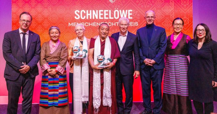 Dr. Sophie Richardson and Geshe Lobsang Monlam receive International Campaign for Tibet’s Snow Lion Human Rights Award from Richard Gere