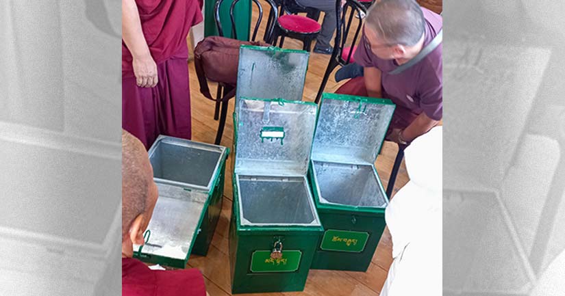 Ballot boxes being checked